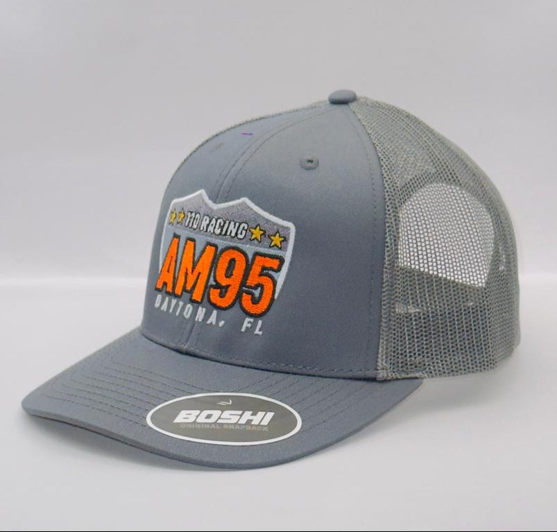 Gray mesh cap with AM95 branding on a gray background